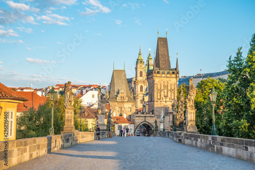 View of Prague, Charles bridge, Vltava river, St. Vitus cathedral on a sunny day