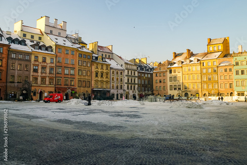 Houses in old town market square, Warsaw, Poland. Winter time with snow