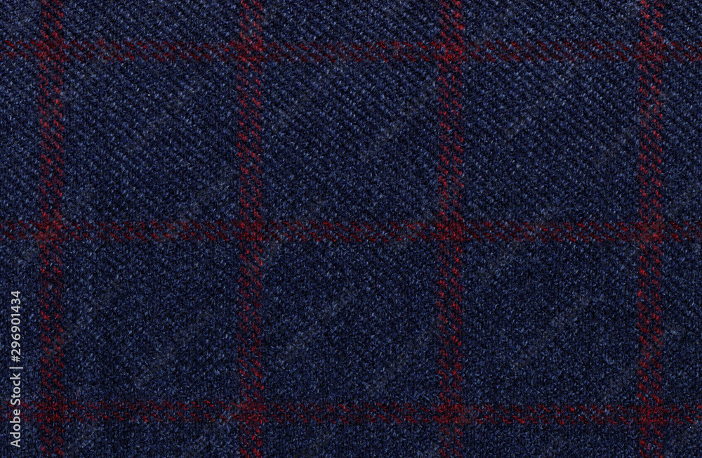 Dark blue woolen fabric. Classic red check. Geometric patterns in fabrics. Wool. Traditional Scottish Glen plaid. High resolution