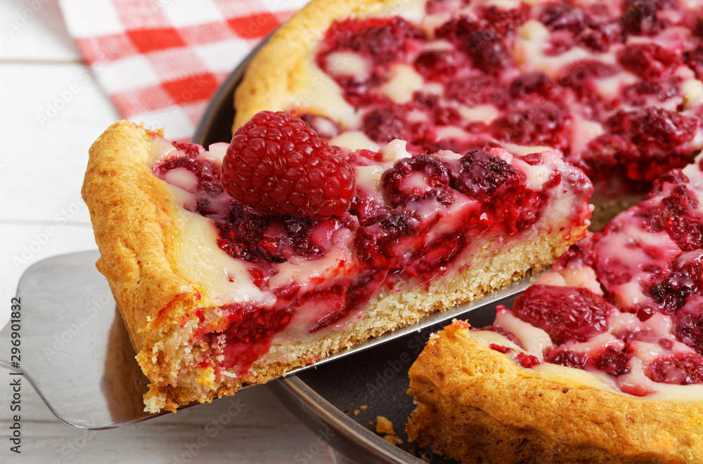 Closeup piece of homemade raspberry pie with yogurt filling. Shallow focus. Closeup piece of homemade raspberry pie with yogurt filling. Shallow focus.