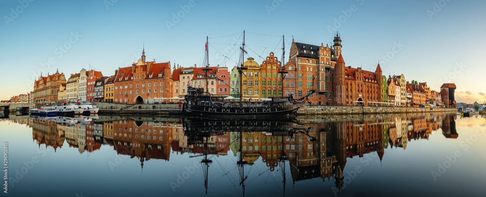 Big panorama of the Gdansk old town and famous crane at sunrise, Poland