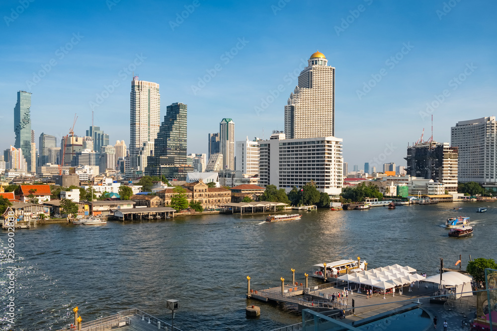 Bangkok skyline and business skyscrapers at Chaopraya river