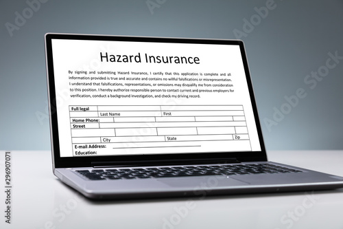 Laptop With Online Hazard Insurance Form