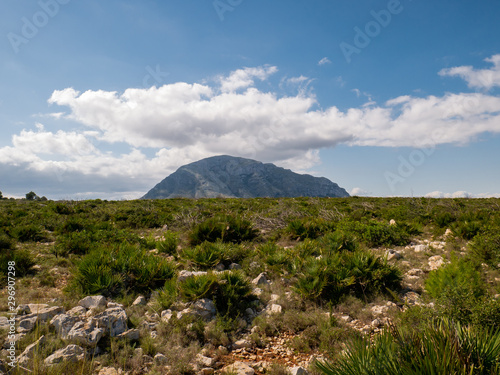  Montgo mountain in Denia with white clouds photo