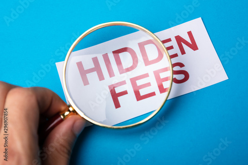 Person Looking At Hidden Fees