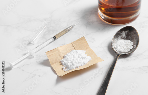 cocaine in paper and equipment on marble background with a blank space for a text, Background from cocaine party