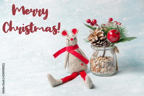 Christmas toy mouse with spruce branch with the inscription merr