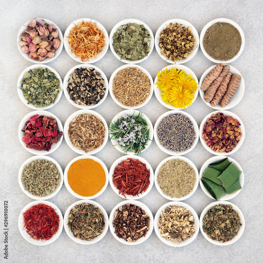 Herb and spice collection used for skin care for anti ageing and to help soothe and heal various skin conditions including acne, eczema & psoriasis. In porcelain bowls. Flat lay. Herb and spice collection used for skin care for anti ageing and to help soothe and heal various skin conditions including acne, eczema & psoriasis. In porcelain bowls. Flat lay.