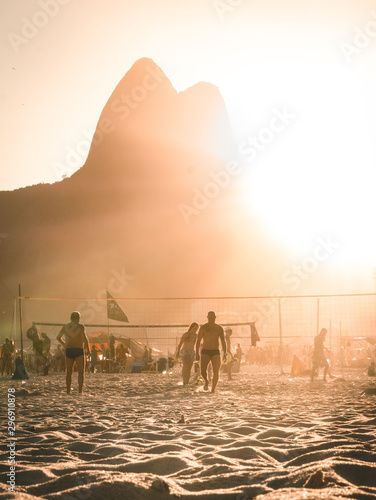 Ipanema Beach with Two Brothers in background - Rio de Janeiro at sunset