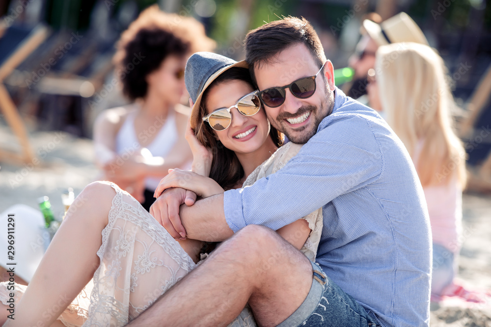 Happy young couple enjoying on the beach Happy young couple enjoying on the beach