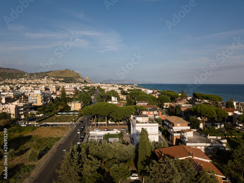 Top view of a coastal town with a beach and beach umbrellas. Terracina, Province of Latina, Lazio Region, Italy