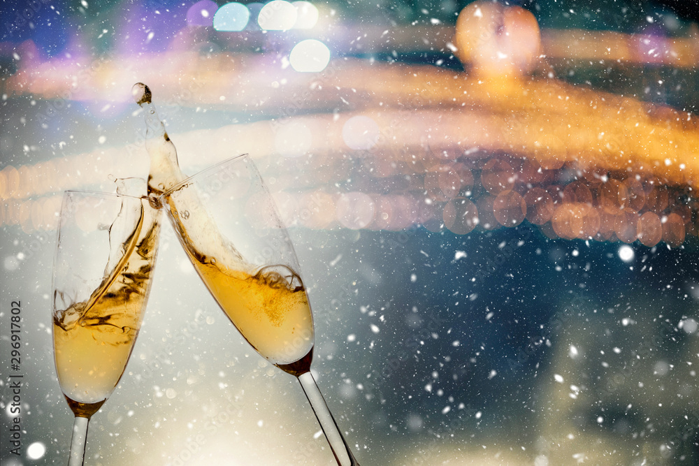 New Year's Eve concept with bokeh, fireworks and glasses of champagne. - obrazy, fototapety, plakaty 