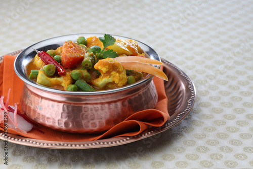 Indian style mix vegetable in a bowl. photo