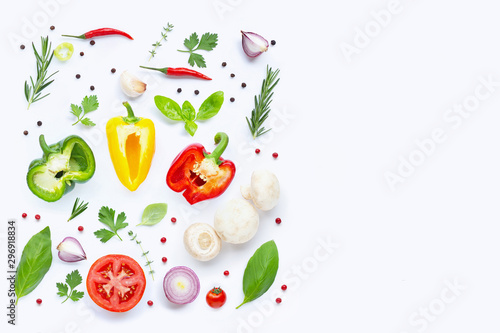 Various fresh vegetables and herbs on white background. Healthy eating concept