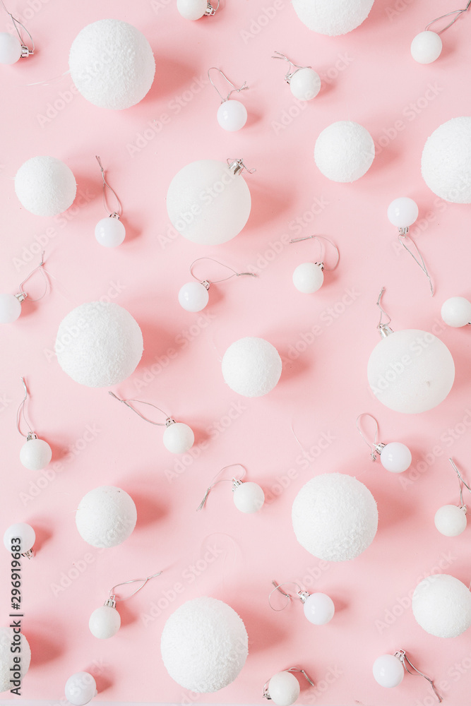 Christmas / New Year holiday composition. Christmas baubles, balls, decoration on pink background. Flat lay, top view festive pattern. Christmas / New Year holiday composition. Christmas baubles, balls, decoration on pink background. Flat lay, top view festive pattern.