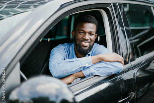 Photography Young african american man driving a car