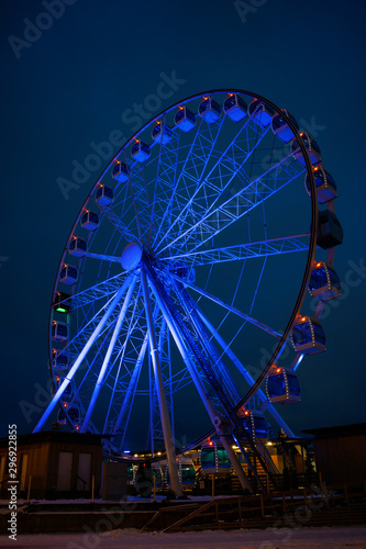 Photo of ferris wheel against background of night sky
