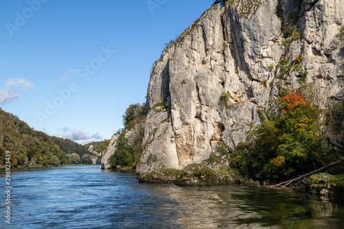 Danube river near Danube breakthrough near Kelheim, Bavaria, Germany in autumn with limestone rock formations and sunny weather with blue sky © Reiner