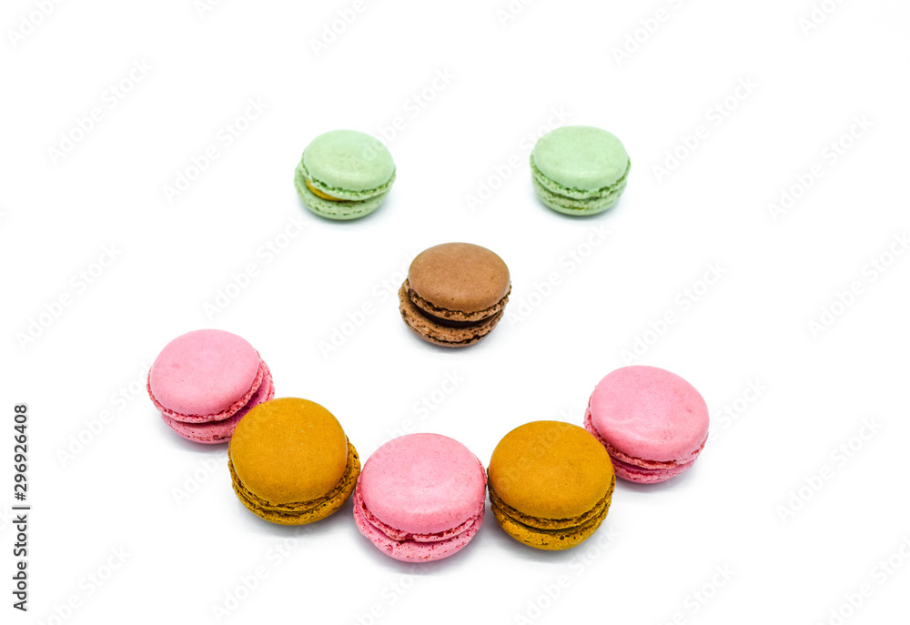 macarons in shape of face, isolated on white background macarons in shape of face, isolated on white background