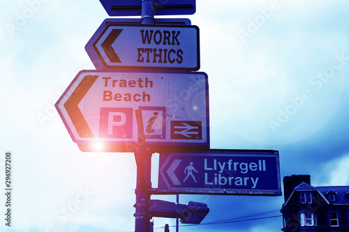 Conceptual hand writing showing Work Ethics. Concept meaning A set of values centered on the importance of doing work Advertisement concept with empty copy space on the road sign photo