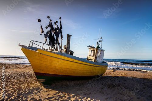 fishing ships on the beach in Rewal, Polish Baltic coast