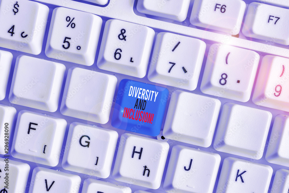 Writing note showing Diversity And Inclusion. Business concept for range huanalysis difference includes race ethnicity gender White pc keyboard with note paper above the white background Writing note showing Diversity And Inclusion. Business concept for range huanalysis difference includes race ethnicity gender White pc keyboard with note paper above the white background