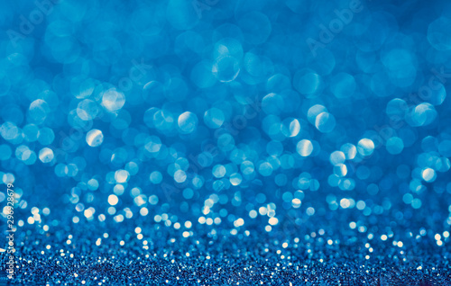 Blue shiny festive christmas background. Beautiful bokeh.