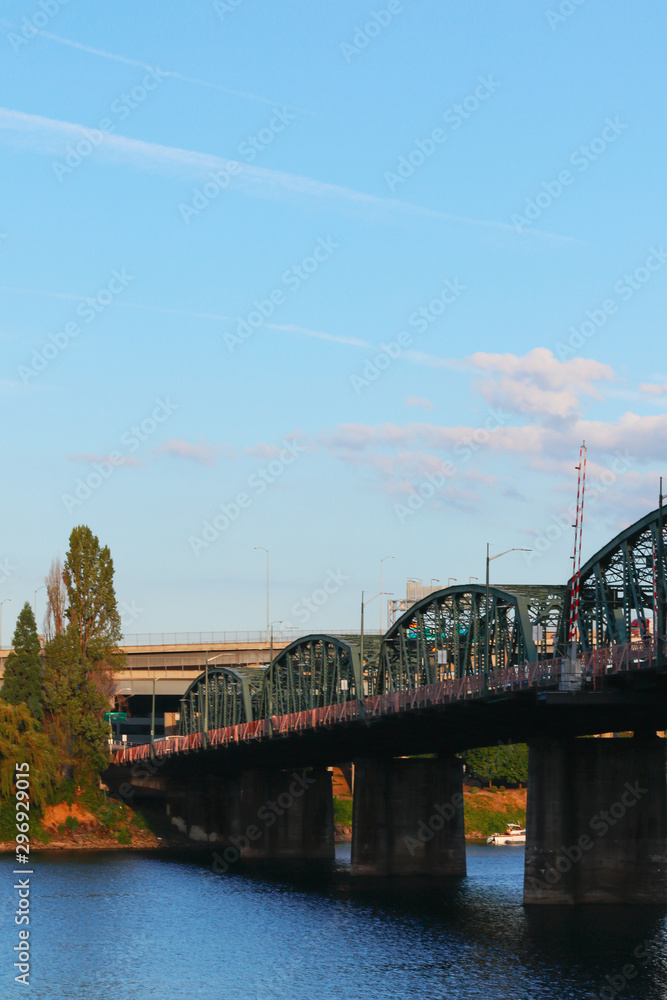 Old steel bridge to transportation on a sunny day. Old steel bridge to transportation on a sunny day.