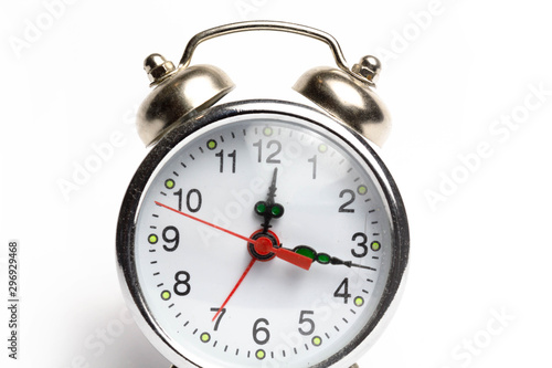 Alarm clock, table clock on a white background isolate