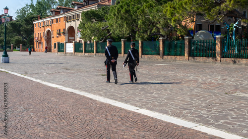 Venice. Beautiful embankment. Carabinieri on the streets of Venice. Ancient Italian city. Travel Tourism in Europe. 