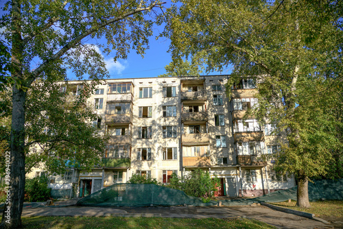 Fivestory house falling under renovation photo