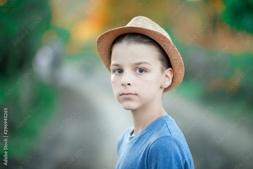 handsome boy, portrait outdoor with natural autumn background