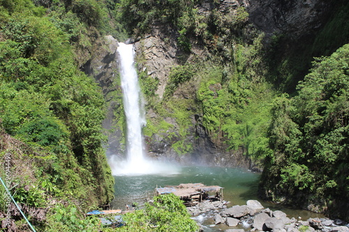 BANAUE, PHILIPPINES - June 03 2016: Rock, pool and waterfall in Batad, near Banaue 