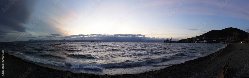 Panorama of the sea landscape in the evening on the waterfront of the city