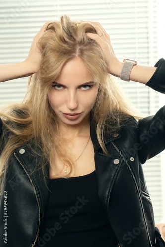 blond in leather