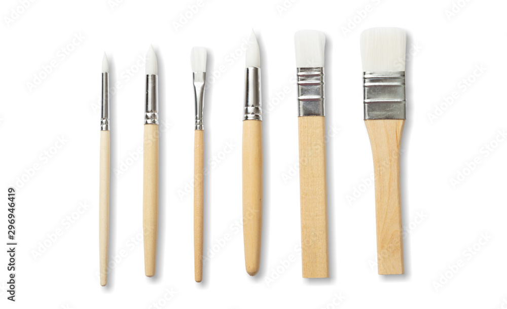 Paint brushes new clean with wooden handle isolated against white background. Paint brushes new clean with wooden handle isolated against white background.