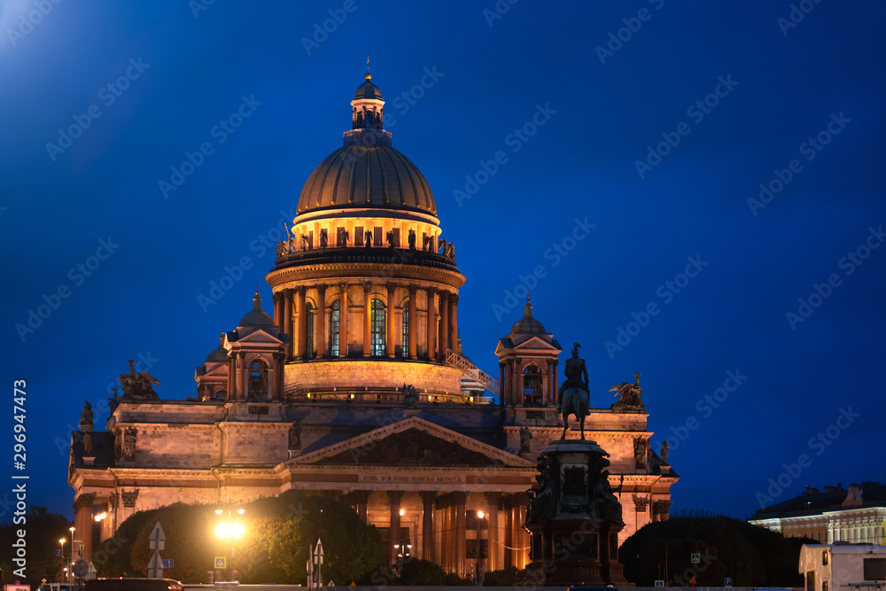 St. Isaac's Cathedral in St. Petersburg. glowing at night in the city.