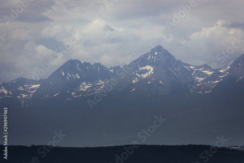 View from rock shelf known as Tomasovsky vyhlad in Slovak Paradise mountain range in Slovakia with peaks of High Tatras Mountains
