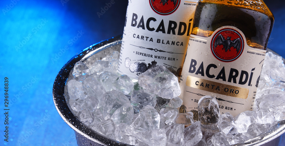 Bottle of Bacardi rum in bucket with crushed ice Stock-Foto | Adobe Stock