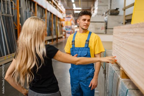 Consultant and female customer in hardware store