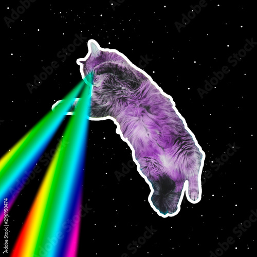 Pink monster cat flies in deep space and shoots lasers from eyes. Art collage concept of 90s or 80s