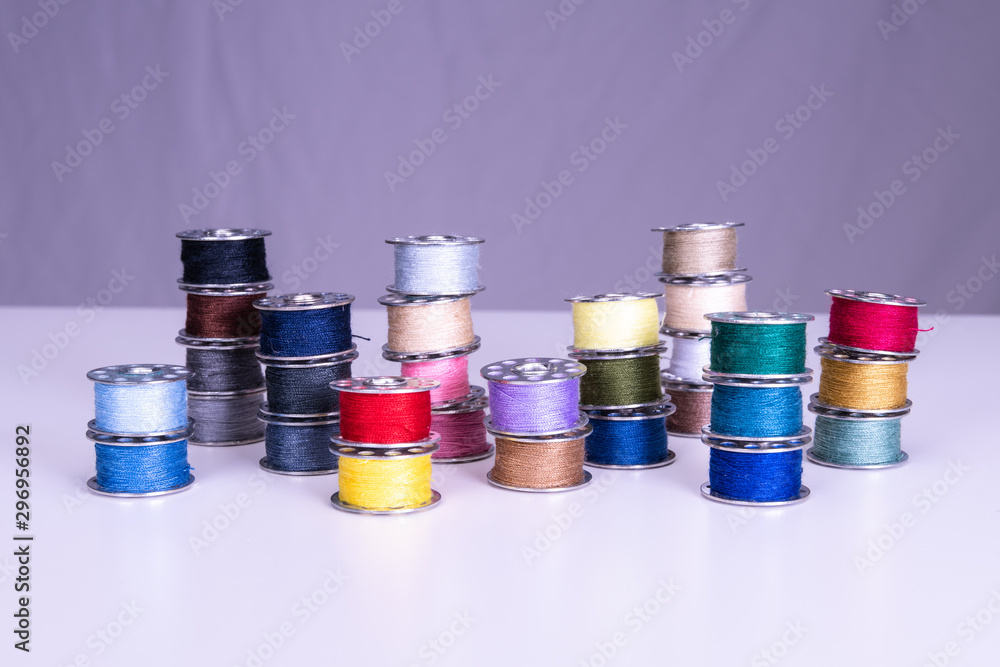 Colorful thread reels on a white background Colorful thread reels on a white background