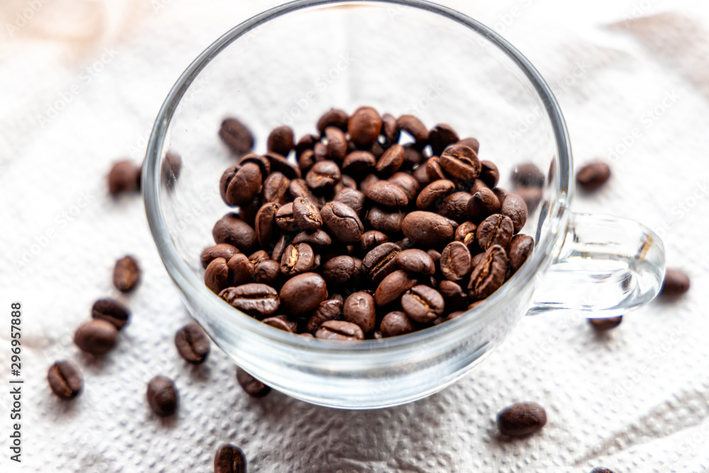 Fototapeta premium Roasted coffee beans on white background