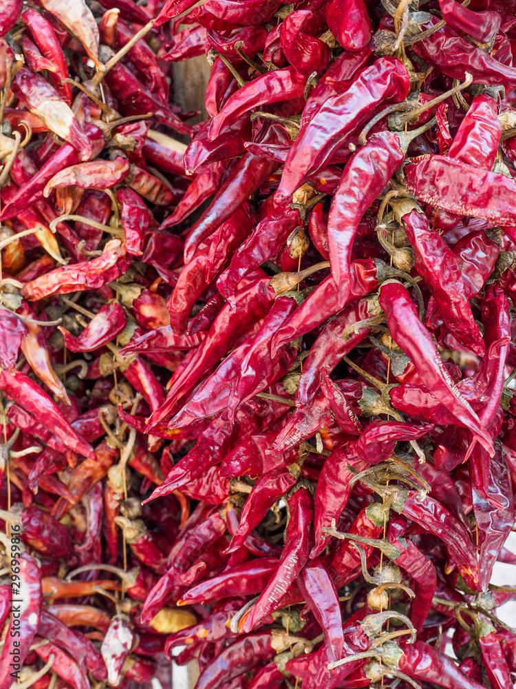 Close up of red paprika peppers. Portrait format.