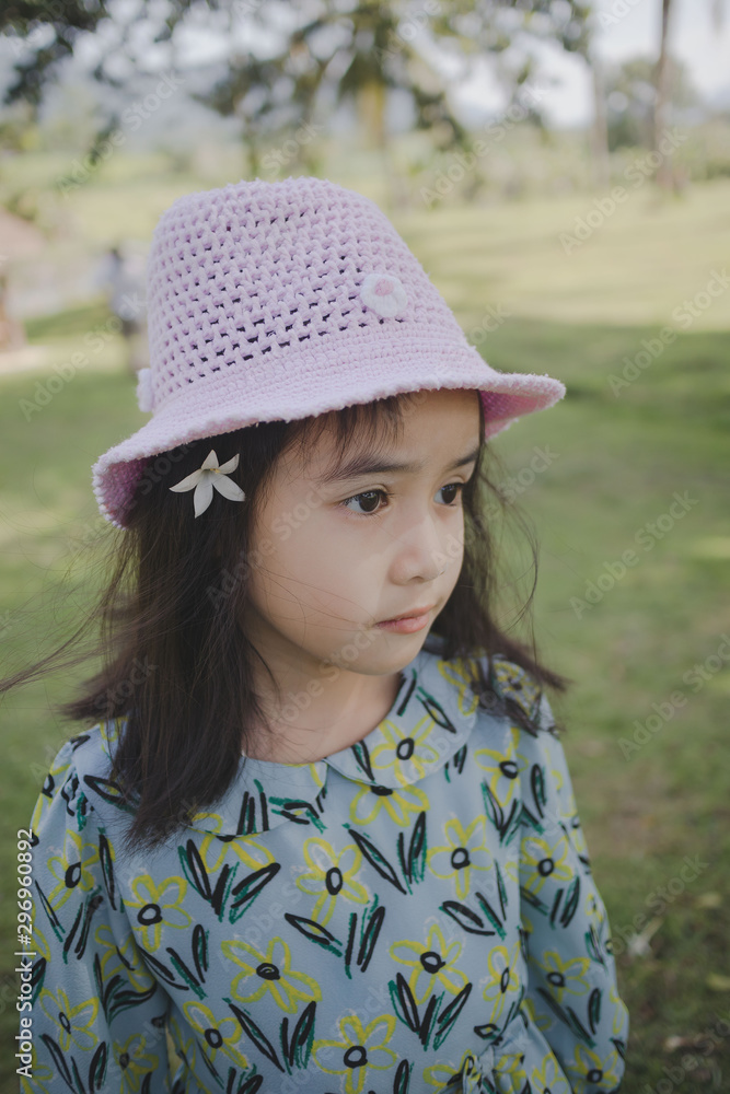 portrait of a little girl at park