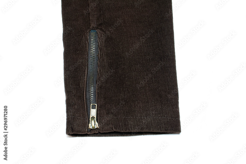 Buttoned zipper on the sleeve of a corduroy jacket on a white background Buttoned zipper on the sleeve of a corduroy jacket on a white background