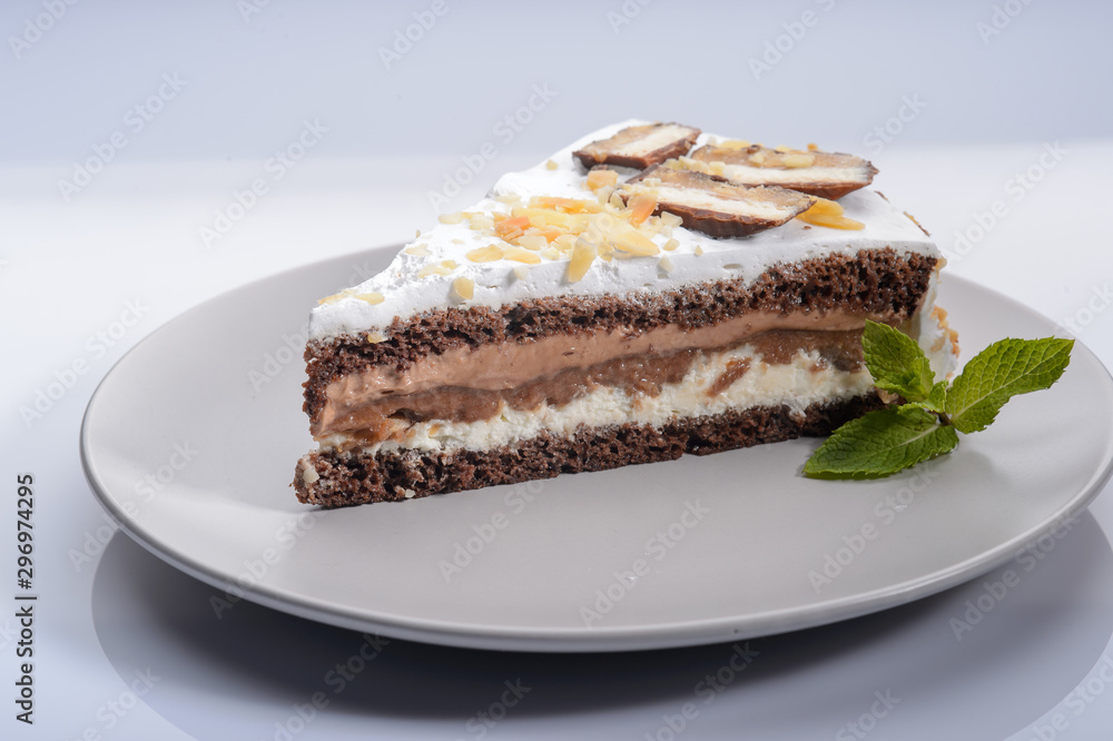 delicious cake with chocolate cream on a gray plate3 delicious cake with chocolate cream on a gray plate3