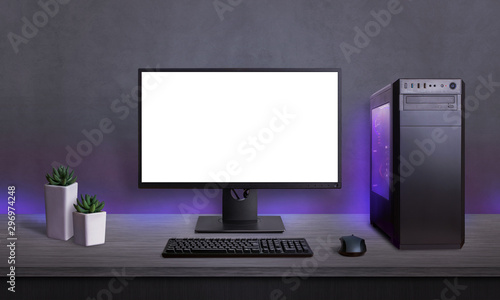 Gaming PC with isolated screen for mockup, app or game presentation. Modern case with RGB light, keyboard and mouse on desk. photo