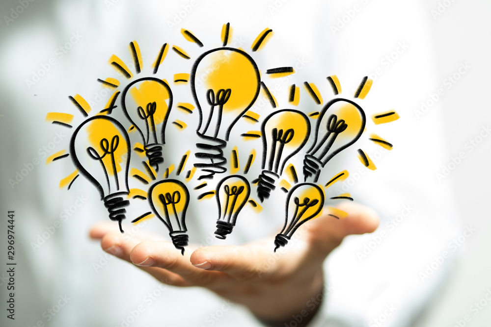 holding illuminated light bulb, idea, innovation and inspiration concept. holding illuminated light bulb, idea, innovation and inspiration concept.