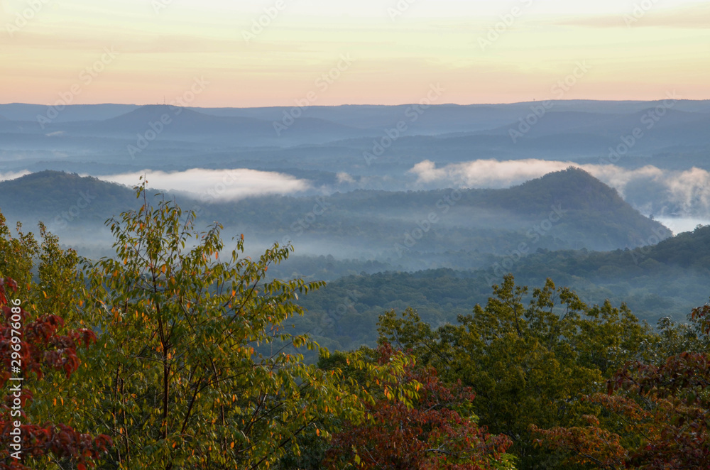 View of the fog covered valley below. Taken from the top of Morrow Mountain State Part NC